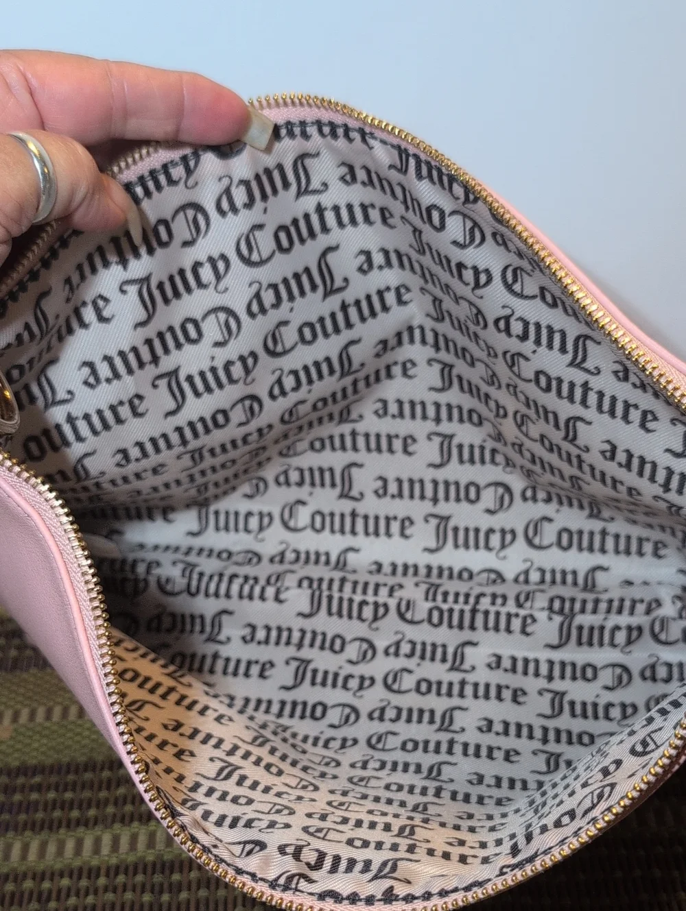 Juicy Couture Light Pink Vegan Leather Clutch Bag With Gold Hardware.